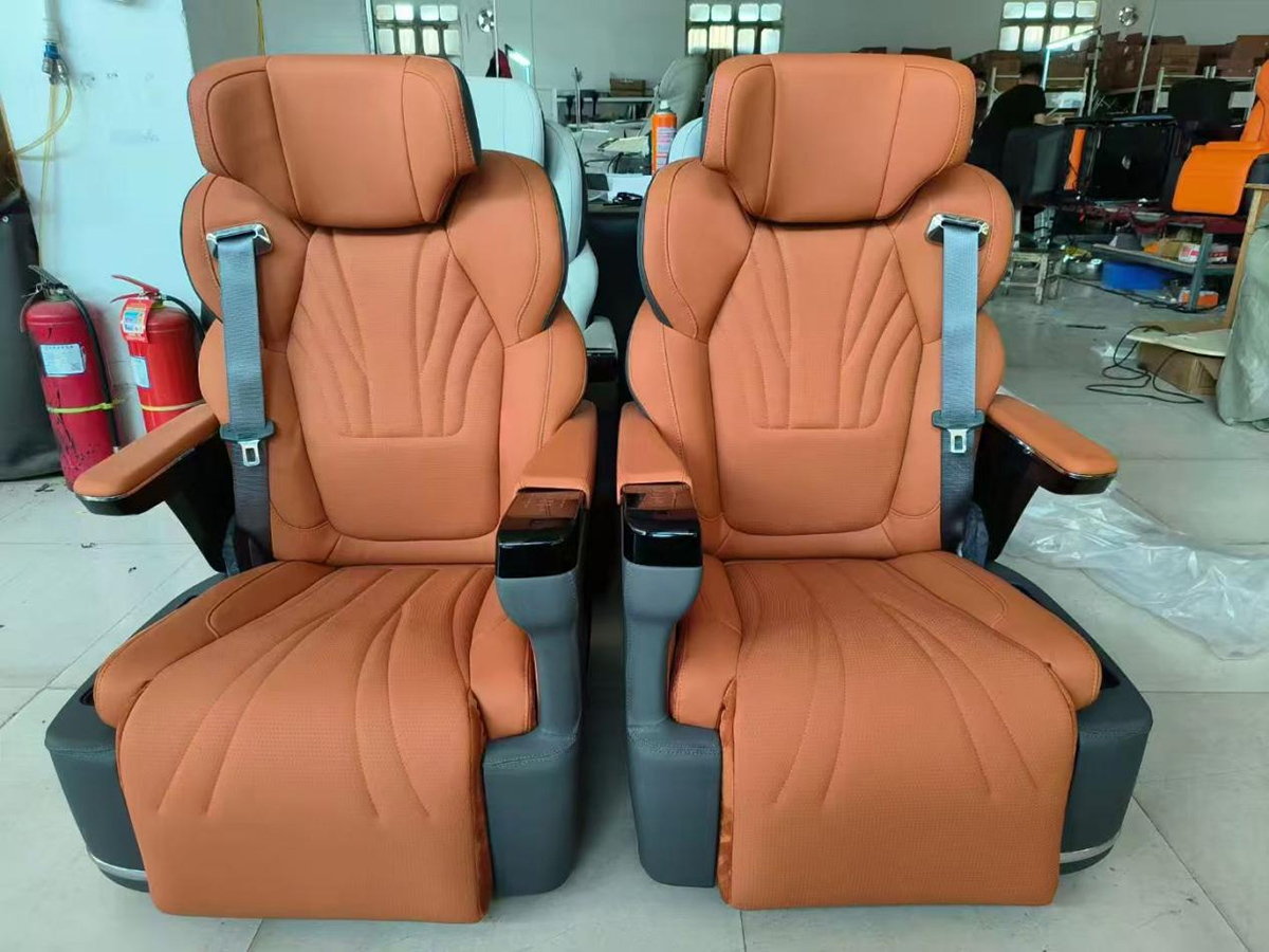 مقاعد قابلة للإمالة في درجة الأعمال